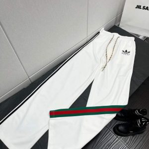 xubag.ru-gucci-696270-adidas-x-gucci-flared-jogging-02