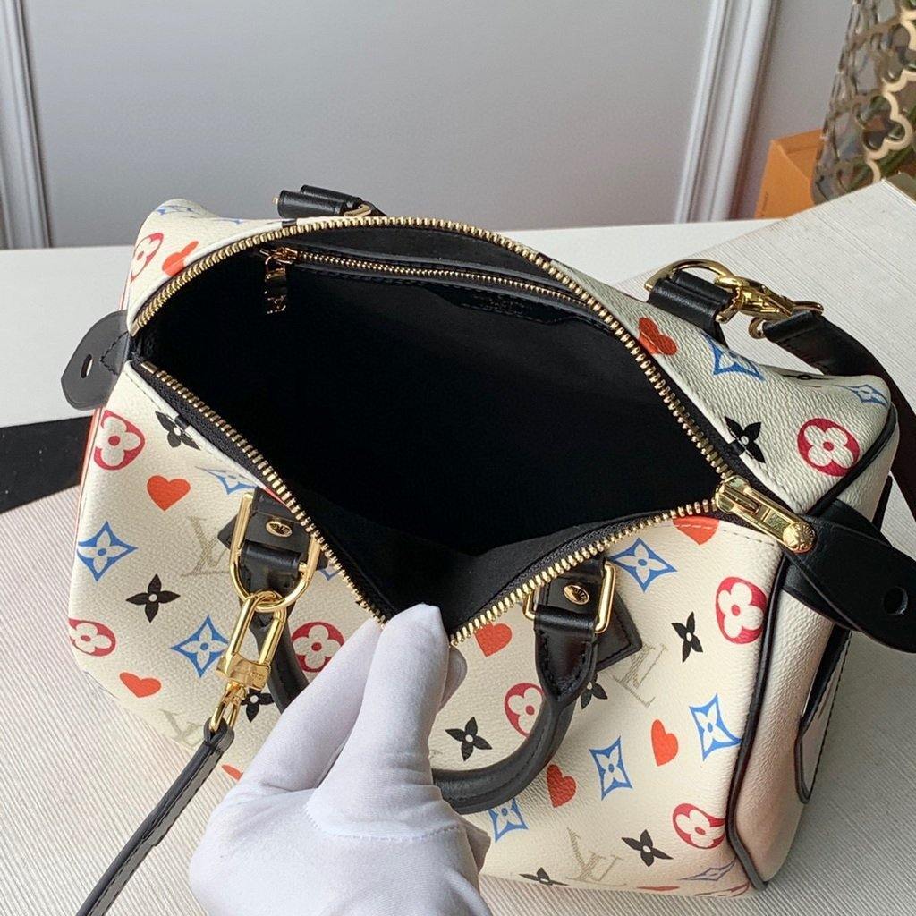 LV M57466 Louis Vuitton GAME ON Speedy Bandouliere 25 Bag White - luxibagsmall